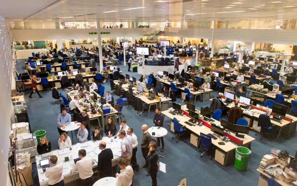 Journalists at work in The Telegraph newsroom