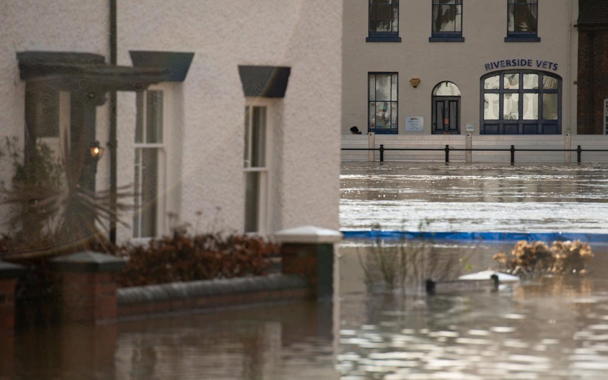 A flooded street in Bewdley, Worcestershire in January. Experiences such as flooding can cause PTSD, psychiatrists said.  - Jacob King /PA