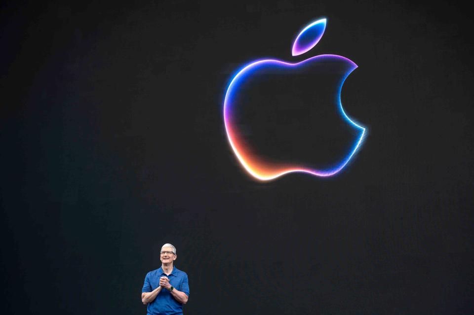 <p> David Paul Morris / Bloomberg / Getty Images</p> Apple CEO Tim Cook speaks at the Apple Worldwide Developers Conference in Cupertino, California, on June 10, 2024.