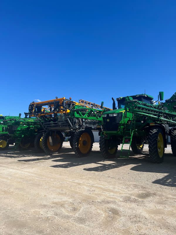 Sprayers are seen on the lot of AHW, LLC, a farm equipment dealer in Somonauk