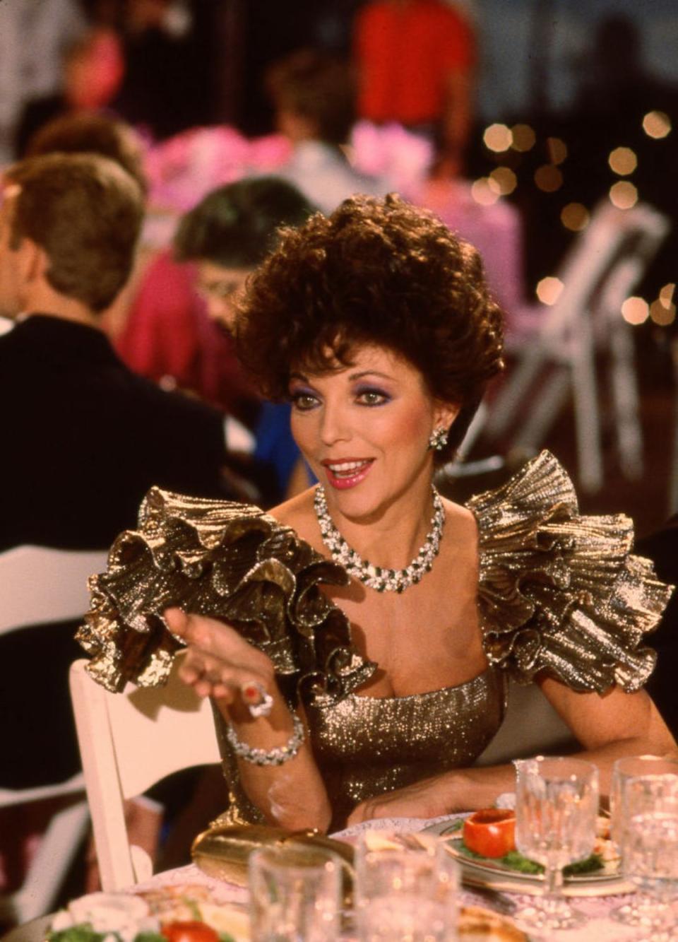 Joan Collins on the set of the soap opera 