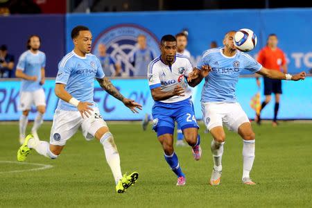 Jun 13, 2015; New York, NY, USA; New York City FC defender Jason Hernandez (21) controls the ball during the second half against the Montreal Impact at Yankee Stadium. New York City FC won 3-1. Mandatory Credit: Anthony Gruppuso-USA TODAY Sports