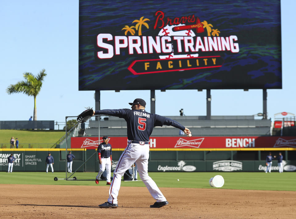 Atlanta Braves first baseman Freedie Freeman and the team take batting practice while preparing to play the Baltimore Orioles in a spring baseball game at the Braves new facility CoolToday Park on Saturday, Feb. 22, 2020, in North Port, Fla. (Curtis Compton/Atlanta Journal-Constitution via AP)