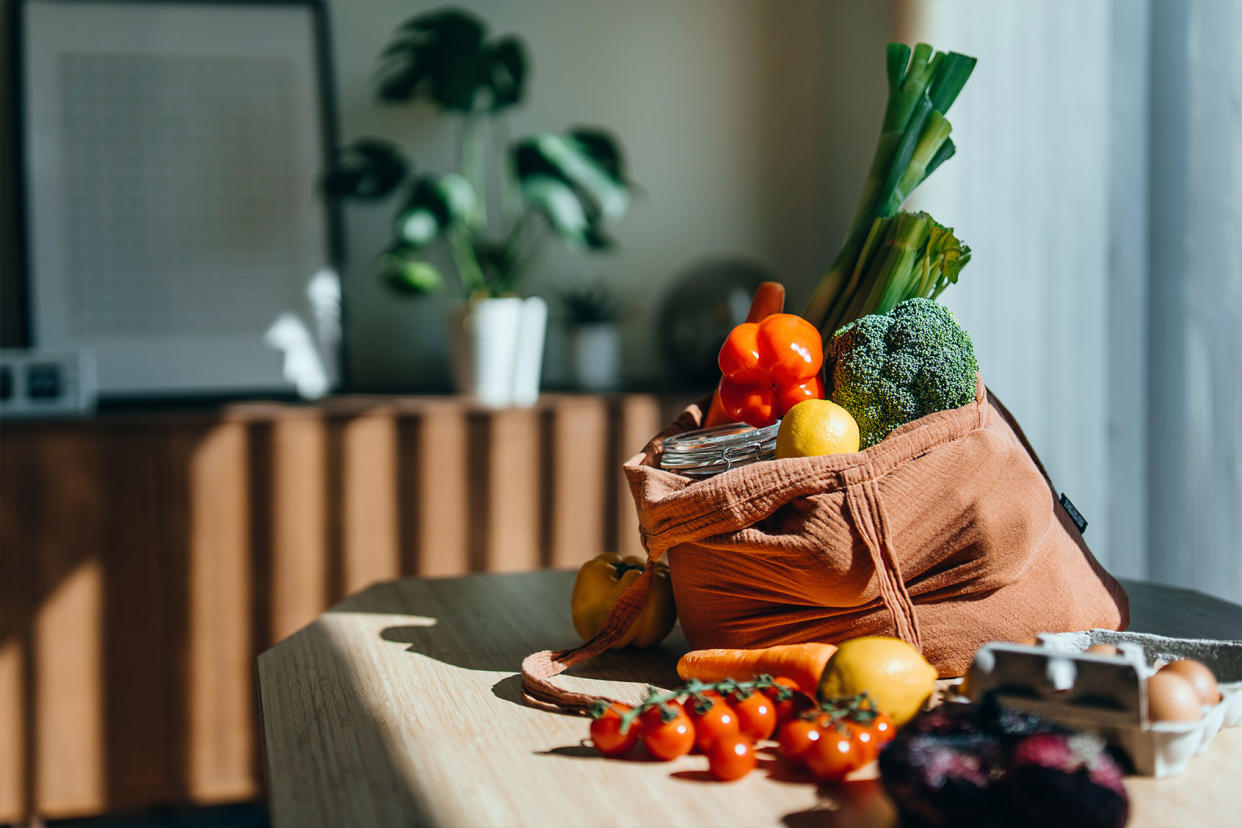 Shopping bag groceries vegetables Getty Images/d3sign