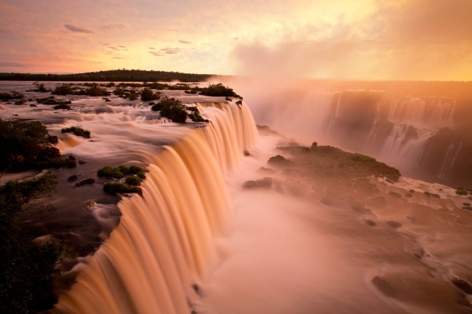 Straddle two countries at Iguazu FallsGetty/iStock