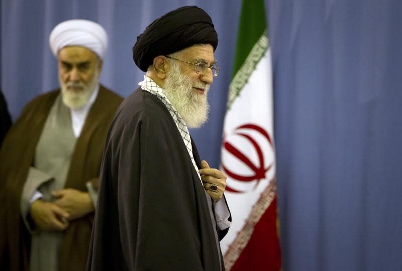 Iran's Supreme Leader Ayatollah Ali Khamenei departs after casting his ballot in the parliamentary election in Tehran March 2, 2012. REUTERS/Caren Firouz 