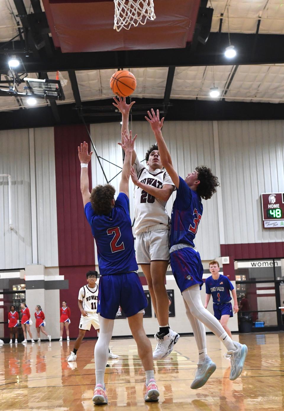 Nowata High School's Talon Thompson (20) makes a lay-up against Caney Valley KS in basketball action in Nowata on Dec. 2, 2024. The Nowata Ironmen defeated the Bullpups 70-53.