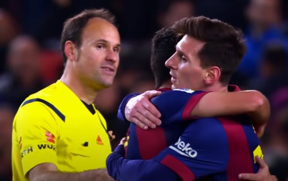 Mateu Lahoz y Leo Messi