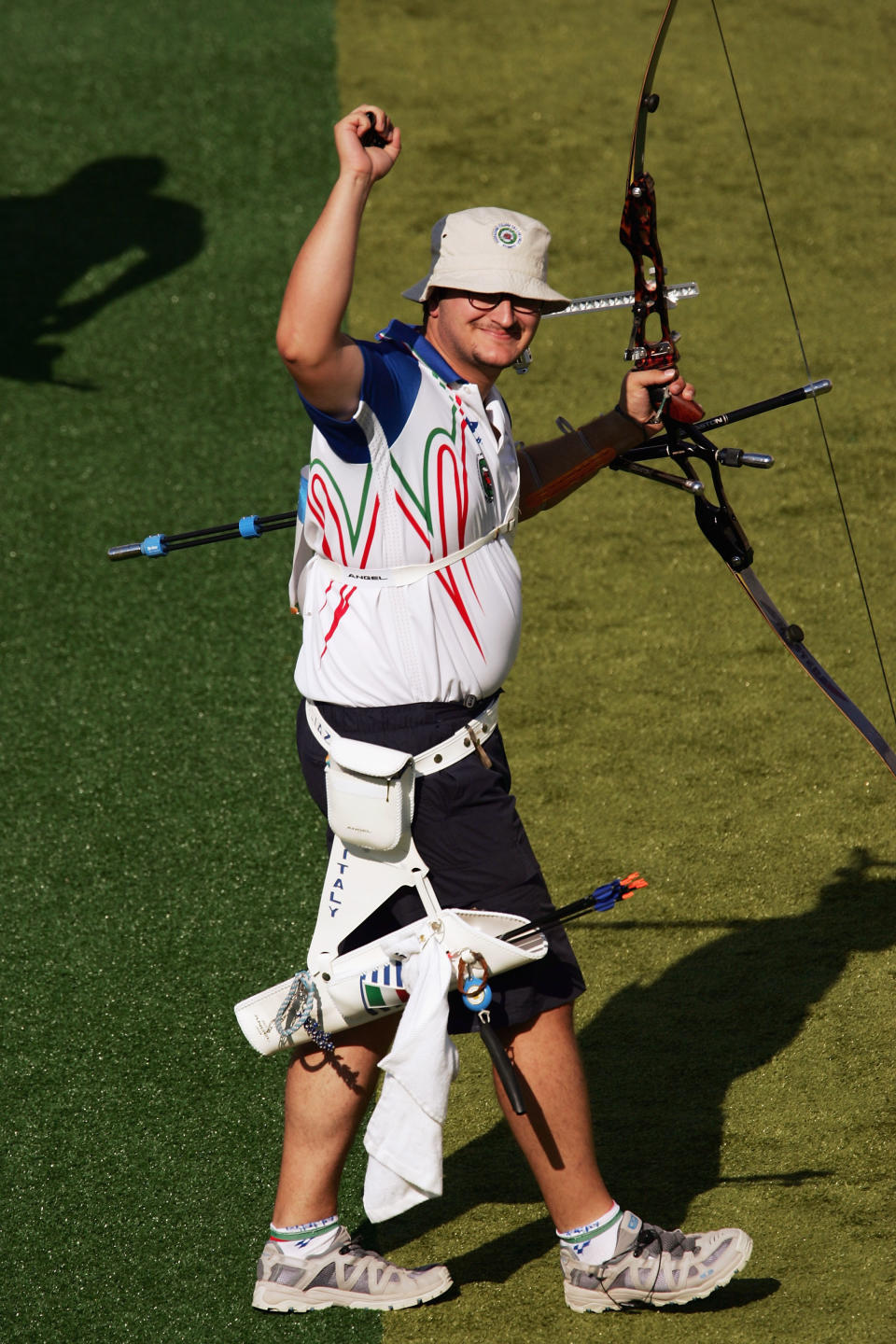 ATHENS - AUGUST 19: Marco Galiazzo of Italy celebrates his victory against Laurence Godfrey in the men's individual semifinal match on August 19, 2004 during the Athens 2004 Summer Olympic Games at Panathinaiko Stadium in Athens, Greece. (Photo by Nick Laham/Getty Images)