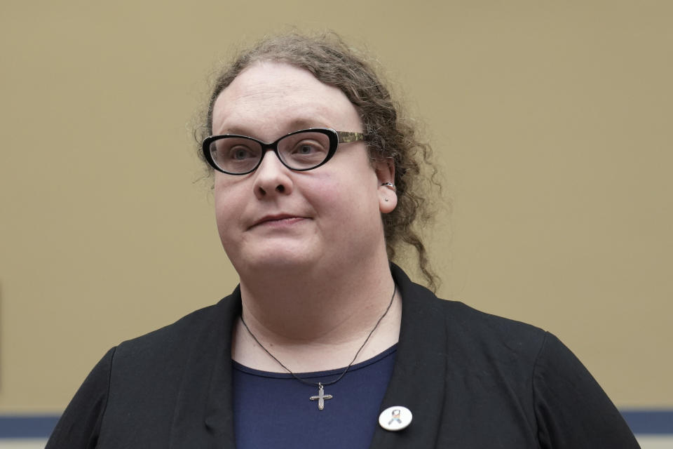 Olivia Hunt, Policy Director, National Center for Transgender Equality, attended for a testifies before a House Oversight Committee hearing, Wednesday, Dec. 14, 2022, on Capitol Hill in Washington. (AP Photo/Mariam Zuhaib)
