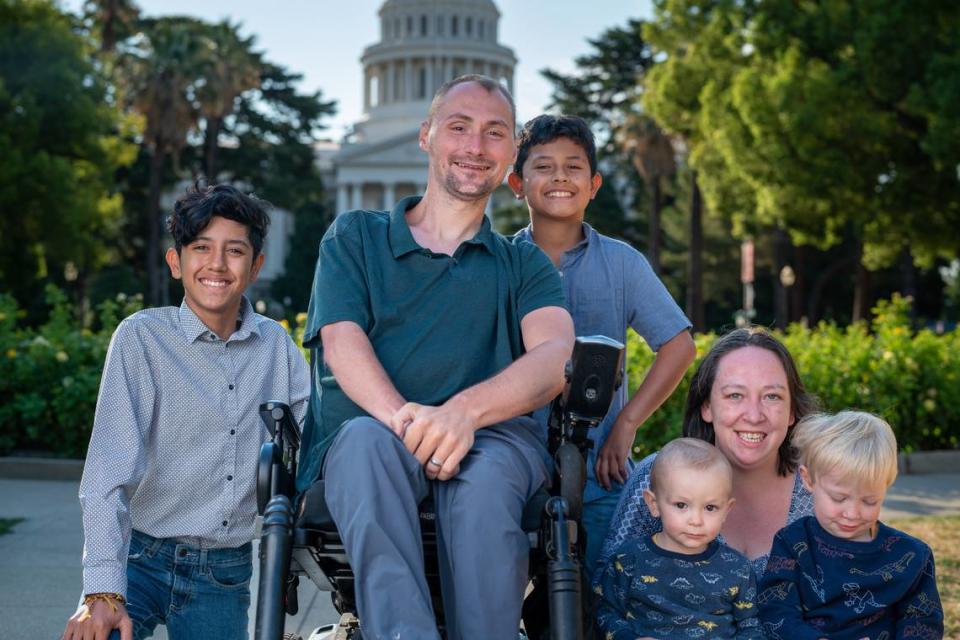 Braden Murphy poses with his wife, Jessica, and their sons, Jose, Adrian, Brandt and Owen. Murphy, a political newcomer, is one of three candidates running to replace Sue Frost to represent District 4 on the Sacramento County Board of Supervisors.