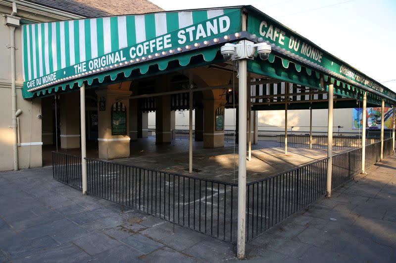 FILE PHOTO: An empty view of the 24-hour French Quarter restaurant Cafe Du Monde amid the outbreak of the coronavirus disease (COVID-19), in New Orleans