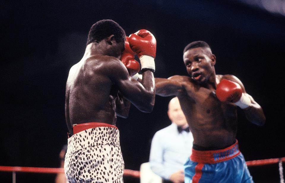 LAS VEGAS - MAY 19,1990: Pernell Whitaker (R) lands  a punch against Azumah Nelson during the fight at Caesars Palace in Las Vegas, Nevada. Pernell Whitaker won the WBC lightweight title and IBF lightweight title.  (Photo by: The Ring Magazine via Getty Images) 