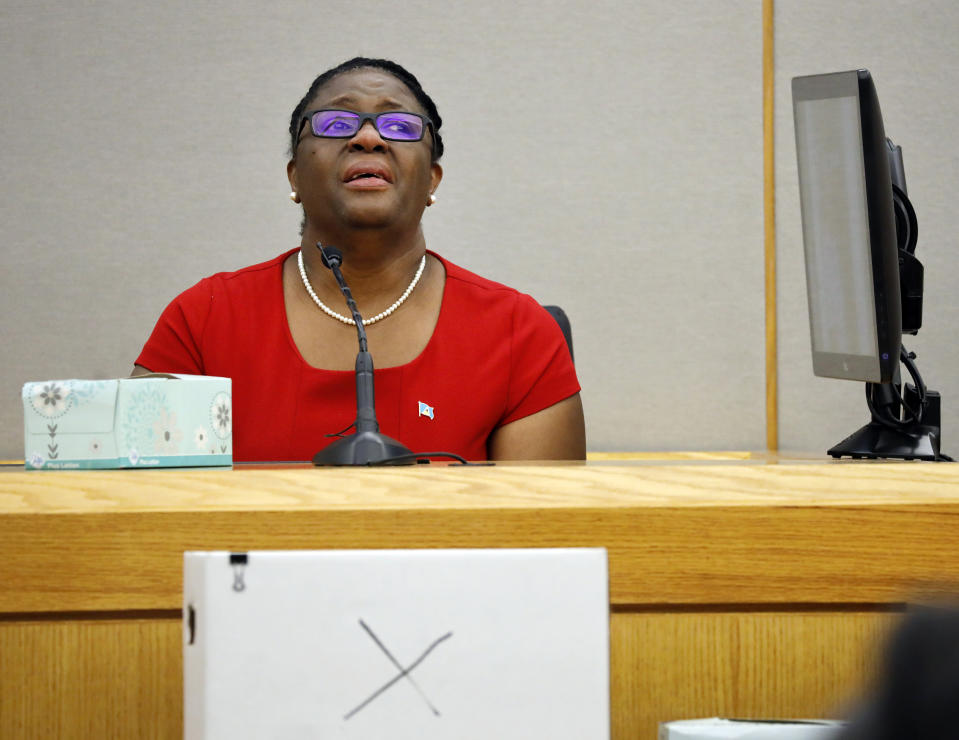 Botham Jean's mother, Allison Jean, speaks about her son during sentencing testimony for former Dallas Police Officer Amber Guyger in 204th District Court at the Frank Crowley Courts Building in Dallas, Tuesday, Oct. 1, 2019. Guyger, who shot her black unarmed neighbor Botham Jean to death after, she said, mistaking his apartment for her own, was convicted of murder Tuesday. (Tom Fox/The Dallas Morning News via AP, Pool)