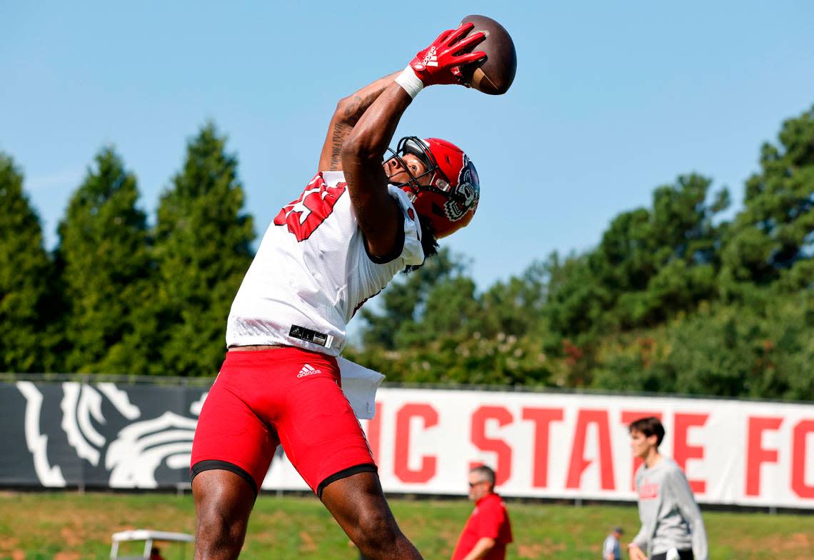 N.C. State wide receiver Jakolbe Baldwin (89) pulls in the reception during the Wolfpack’s first practice of fall camp in Raleigh, N.C., Wednesday, August 3, 2022.