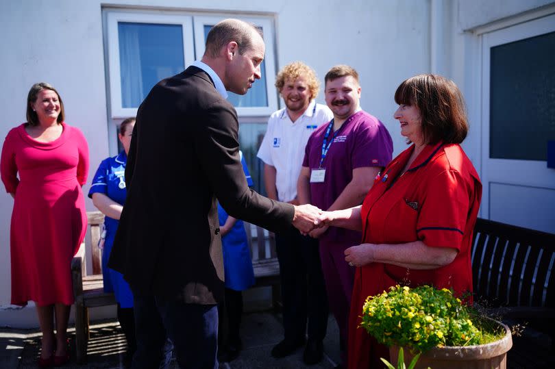 Prince William speaks to hospital staff -Credit:Getty Images