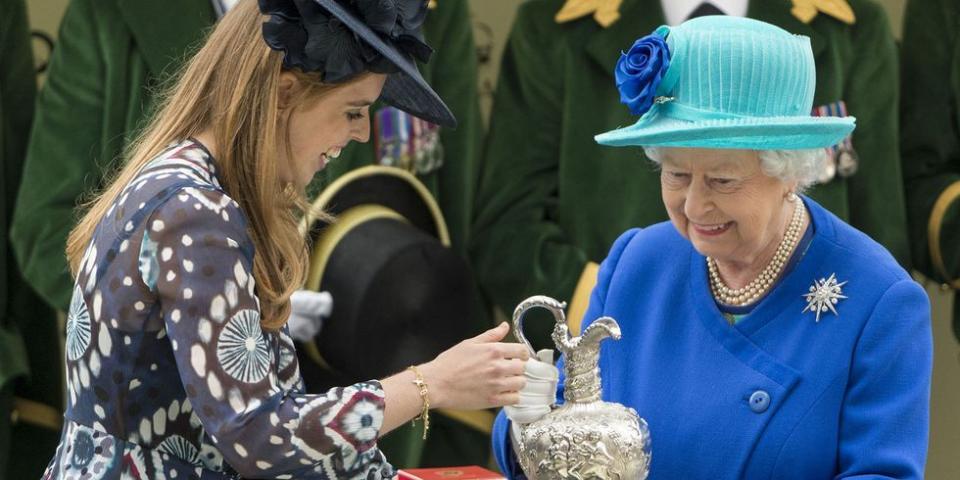 <p>Princess Beatrice presents her grandmother with first prize after her horse won the Hardwick Stakes during the Royal Ascot.</p>