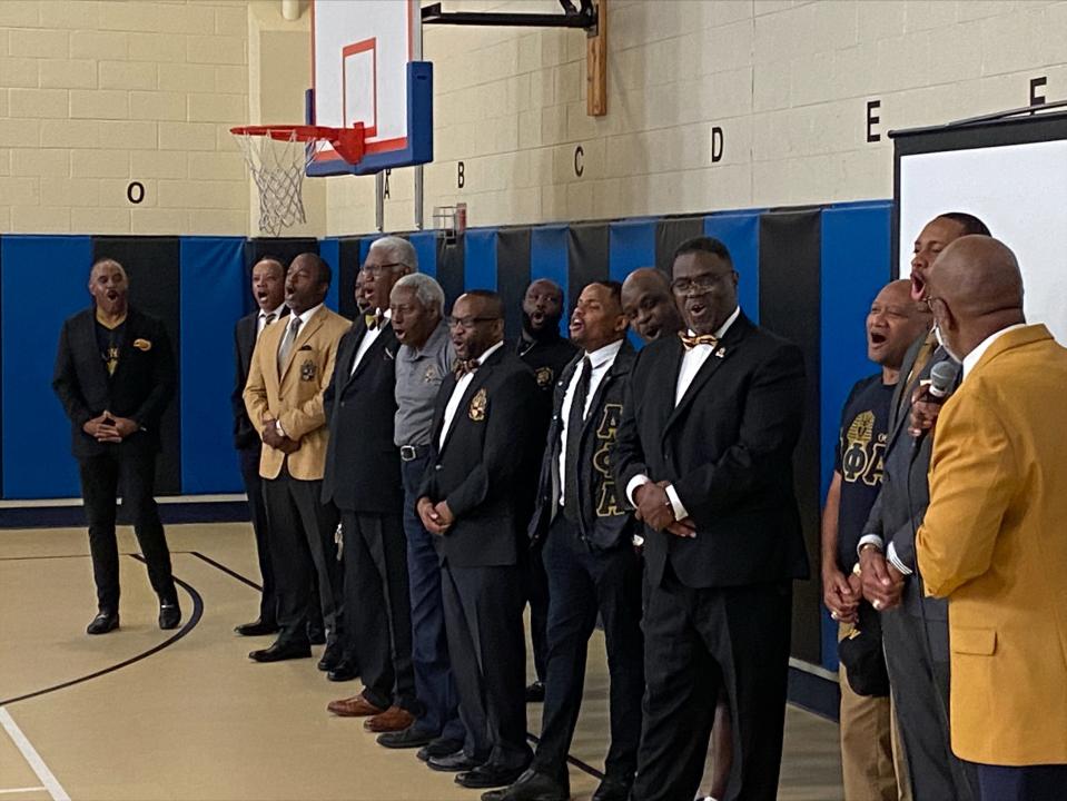 The brothers of the Zeta Epsilon Chapter of Alpha Phi Alpha Fraternity showing the Thurgood Marshall students their own chant after the students did theirs.