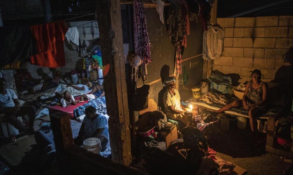 People displaced by gang violence occupy a school turned into a long-term shelter, in Port-au-Prince, Haiti, in September.