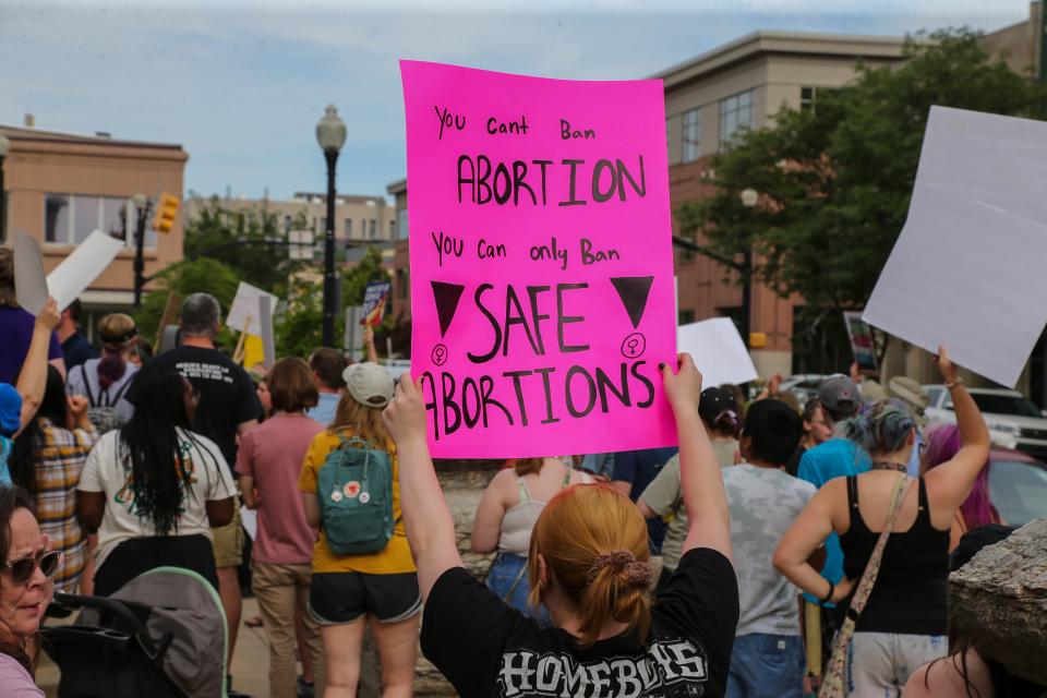 More than 100 people gathered at the Tippecanoe County Courthouse in Lafayette, Ind., June 24, 2022, hours after the U.S. Supreme Court ruled 6-3 to overturn Roe v. Wade, the landmark decision that gave a woman the right to an abortion 50 years ago.