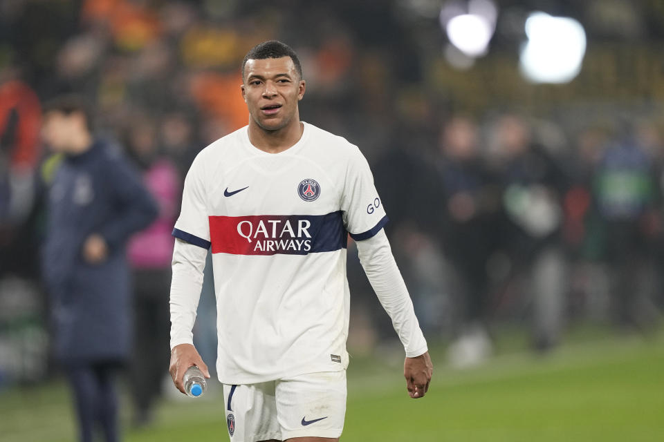 PSG's Kylian Mbappe walks after the Champions League Group F soccer match between Borussia Dortmund and Paris Saint-Germain at the Signal Iduna Park in Dortmund, Germany, Wednesday, Dec. 13, 2023. (AP Photo/Martin Meissner)