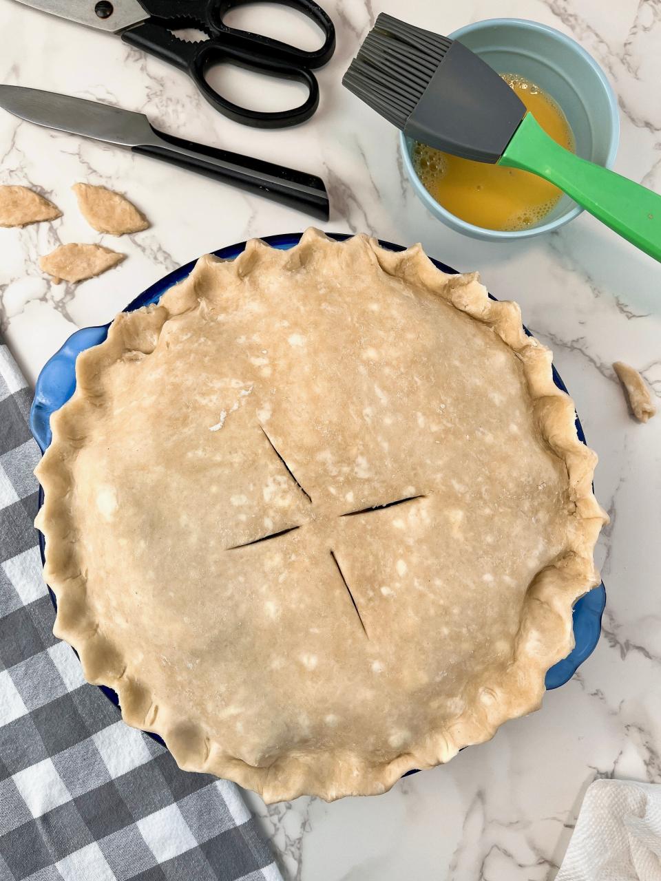 Use your second crust to cover the pie. Be sure to cut air vents in the top.