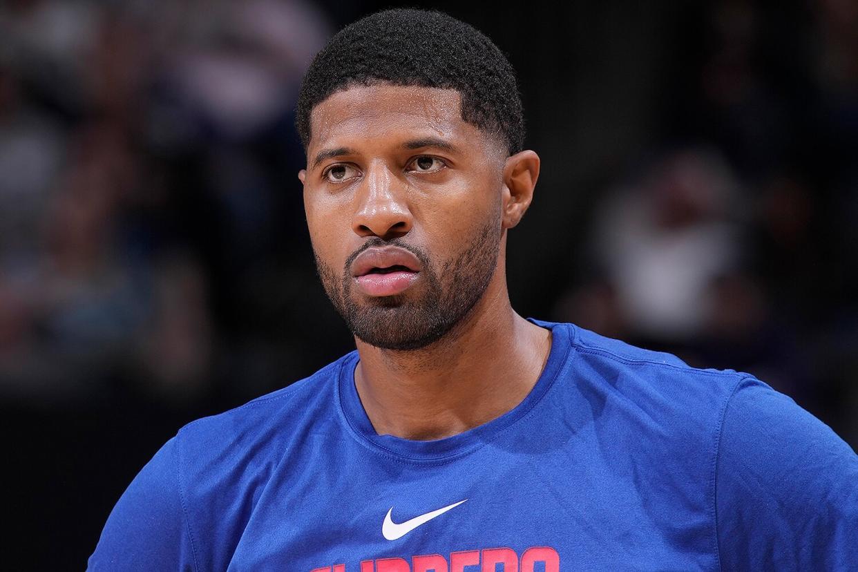 Paul George #13 of the Los Angeles Clippers looks on during the game against the Sacramento Kings on October 22, 2022 at Golden 1 Center in Sacramento, California.