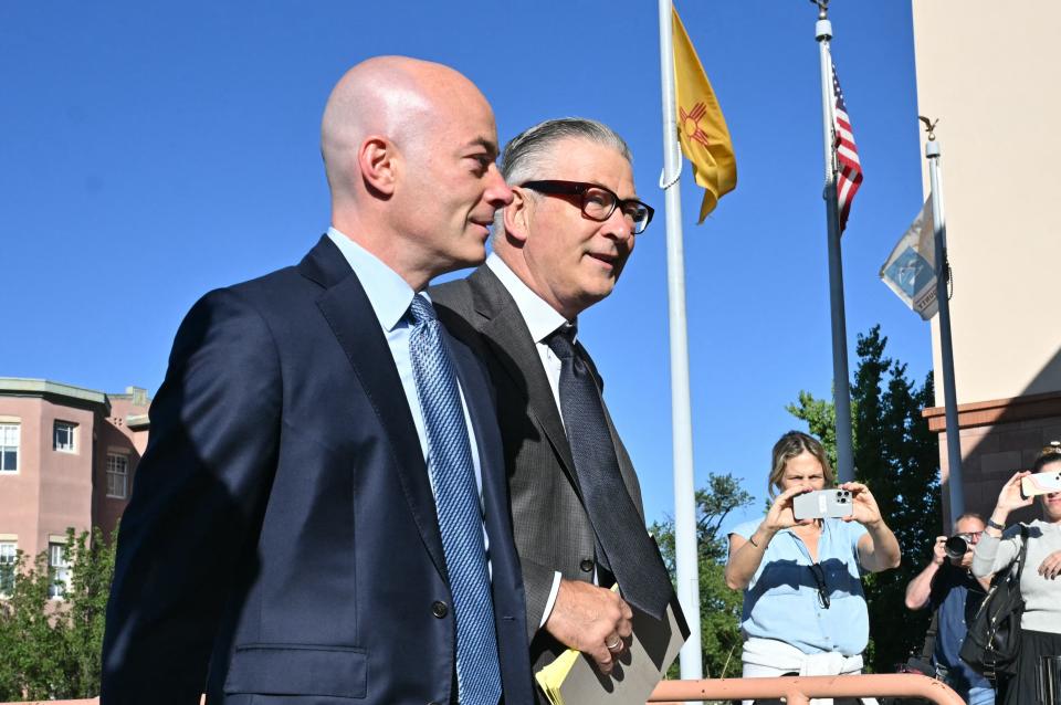 Alec Baldwin, right, arrives for jury selection in his trial for involuntary manslaughter in Santa Fe, New Mexico, on July 9, 2024.