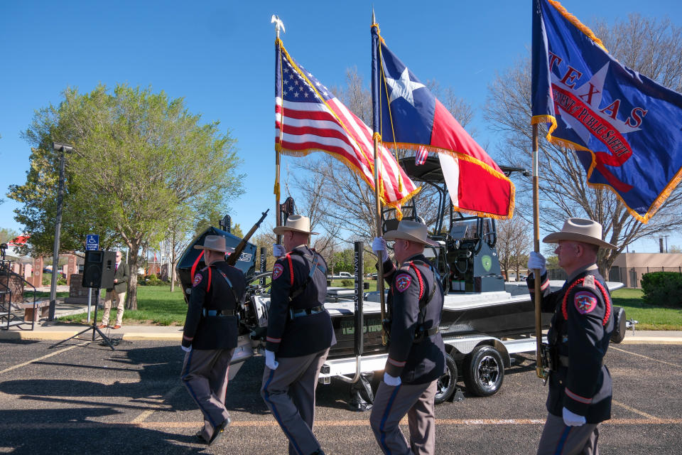 The DPS Color guard takes colors to stage Thursday at the Texas Panhandle War Memorial Center in Amarillo.