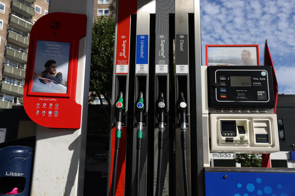 LONDON, ENGLAND - JULY 24: A fuel pump at an Esso Tesco petrol station on July 24, 2022 in London, England. Many Supermarket Fuel Stations are still charging high prices on the forecourt despite wholesale prices coming down over the last few weeks. (Photo by Hollie Adams/Getty Images)
