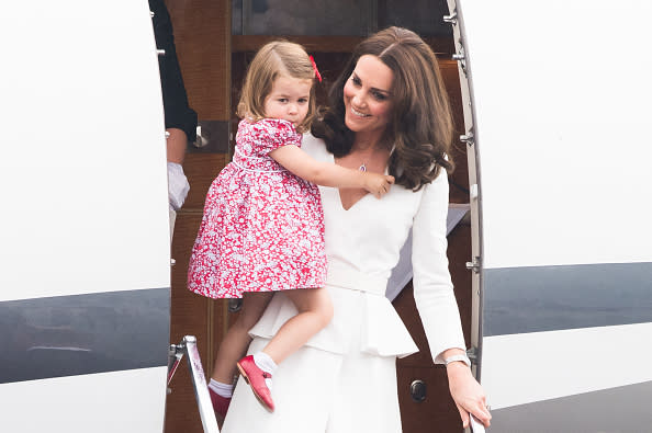 The adorable red shoes Princess Charlotte rocked in Poland are apparently Prince Harry hand-me-downs, and aww