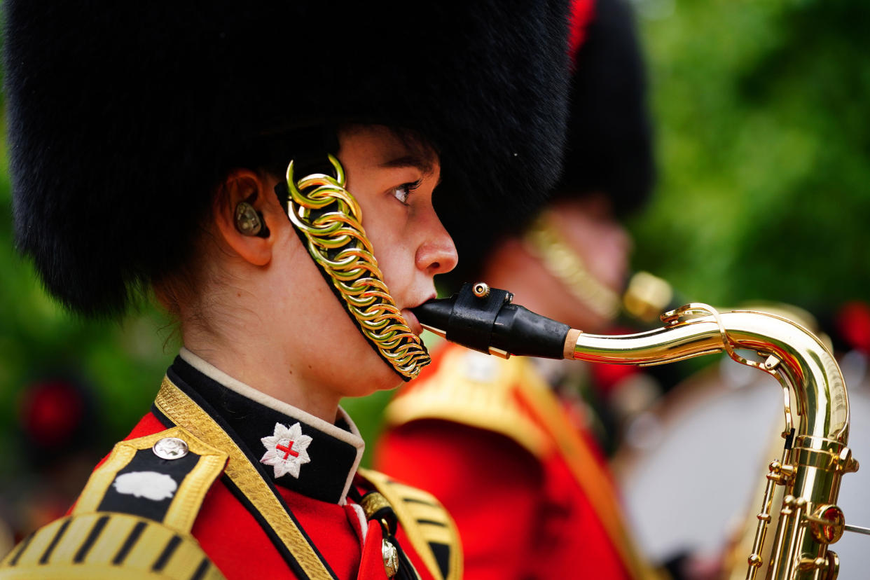 LONDON, ENGLAND - JULY 6: The Band of the Coldstream Guards play 'Three Lions' and 'Sweet Caroline' in the gardens of Clarence House ahead of England's Euro 2020 semi-final game against Denmark on July 6, 2021 in in London, England. In support to the England Football Team as they approach their Semi-Final match in the UEFA Euro Championships on Wednesday evening The Prince of Wales and The Duchess of Cornwall invited the Band of the Coldstream Guards into the Clarence House Garden to play the following pieces: Three Lions – Composed by Ian Broudie, arranged by Oliver Jeans and Sweet Caroline – Composed by Neil Diamond, arranged by Tim Waters.  (Photo by Victoria Jones-WPA Pool/Getty Images)