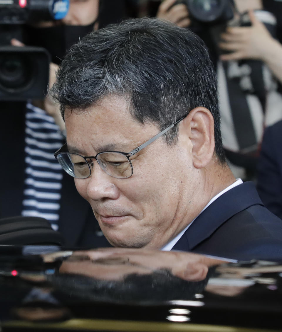 South Korean Unification Minister Kim Yeon-chul gets into a car as he leaves the government complex in Seoul, South Korea, Friday, June 19, 2020. South Korean President Moon Jae-in on Friday accepted the resignation of his point man on North Korea, who had asked to quit after the North destroyed a liaison office while ramping up pressure against Seoul amid stalled nuclear negotiations with the Trump administration. (AP Photo/Lee Jin-man)