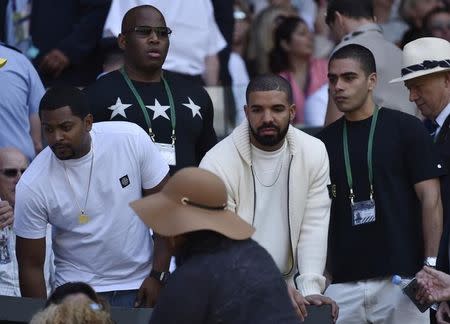 Rapper Drake, on Centre Court at the Wimbledon Tennis Championships in London, July 11, 2015. REUTERS/Toby Melville