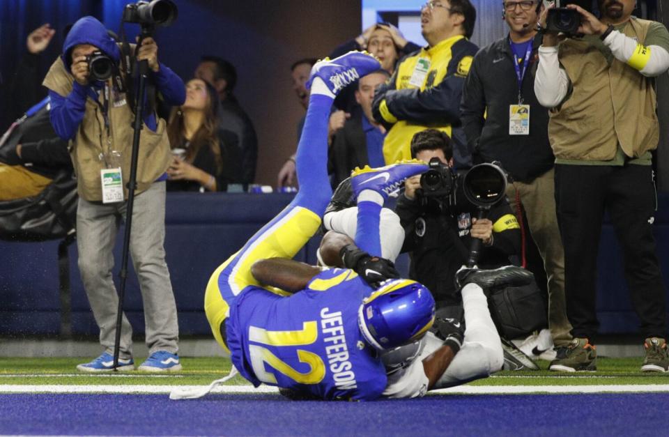 The Rams' Van Jefferson (12) catches the game winning 23-yard touchdown pass against the Raiders.