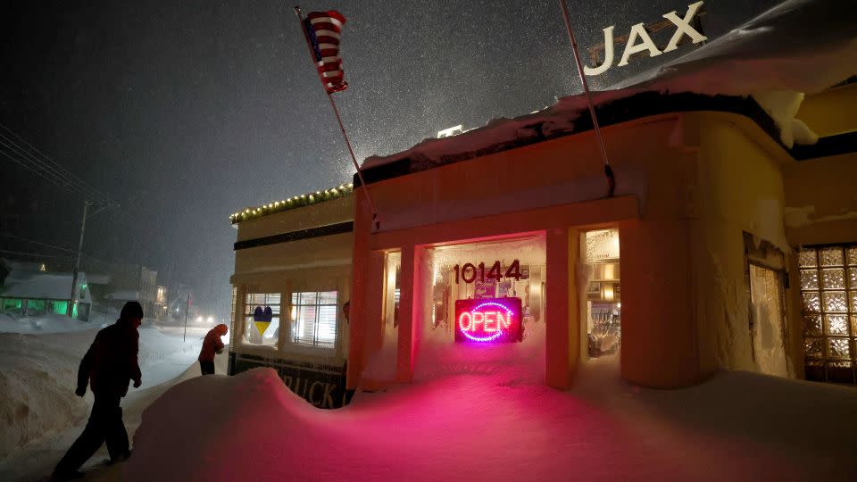 Photos California towns buried under more than 10 feet of snow