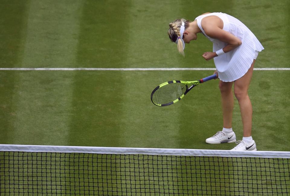 Fist pumps – from both Bouchard on court and coach Nick Saviano in the stands – were the trademark of this second-round match. (REUTERS/Toby Melville)