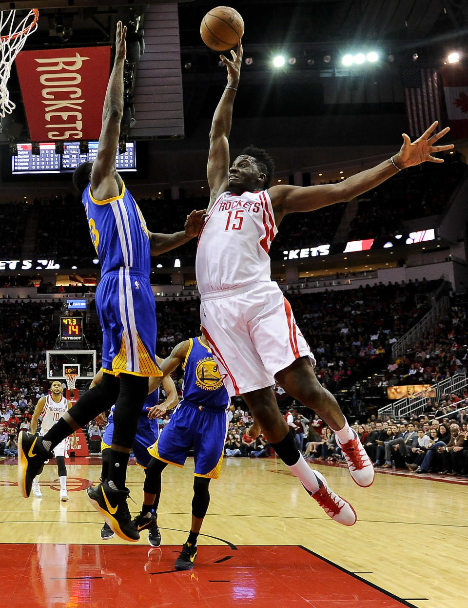 Houston Rockets center Clint Capela (15) shoots as Golden State Warriors forward Draymond Green defends during the first half of an NBA basketball game, Friday, Jan. 20, 2017, in Houston. (AP Photo/Eric Christian Smith)