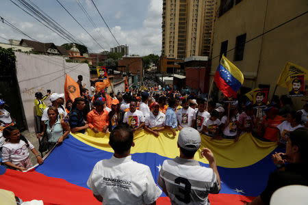 Opposition supporters attend a rally in support of political prisoners and against Venezuelan President Nicolas Maduro, in downtown Los Teques, Venezuela April 28, 2017. REUTERS/Marco Bello