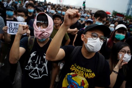 FILE PHOTO: Demonstration demanding Hong Kong's leaders to step down and withdraw the extradition bill, in Hong Kong