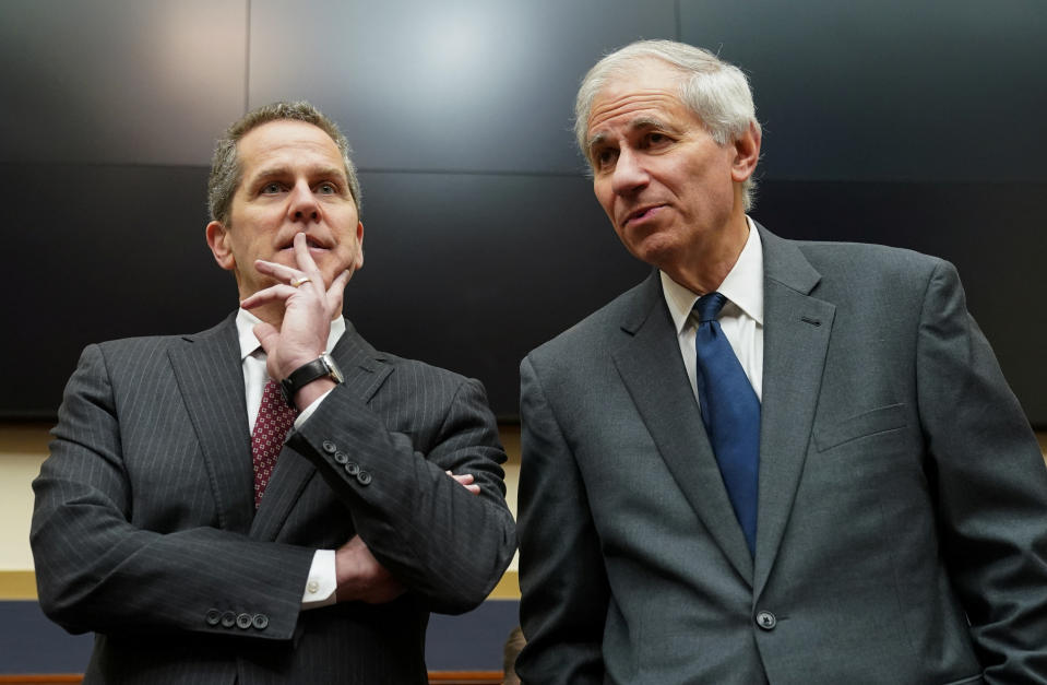 Federal Reserve Board Vice Chair for Supervision Michael Barr (L) and Federal Deposit Insurance Corporation Chairman Martin Gruenberg speak before testifying at a House Financial Services Committee hearing on the response to the on recent bank failures of Silicon Valley Bank and Signature Bank, on Capitol Hill in Washington, U.S., March 29, 2023.  REUTERS/Kevin Lamarque