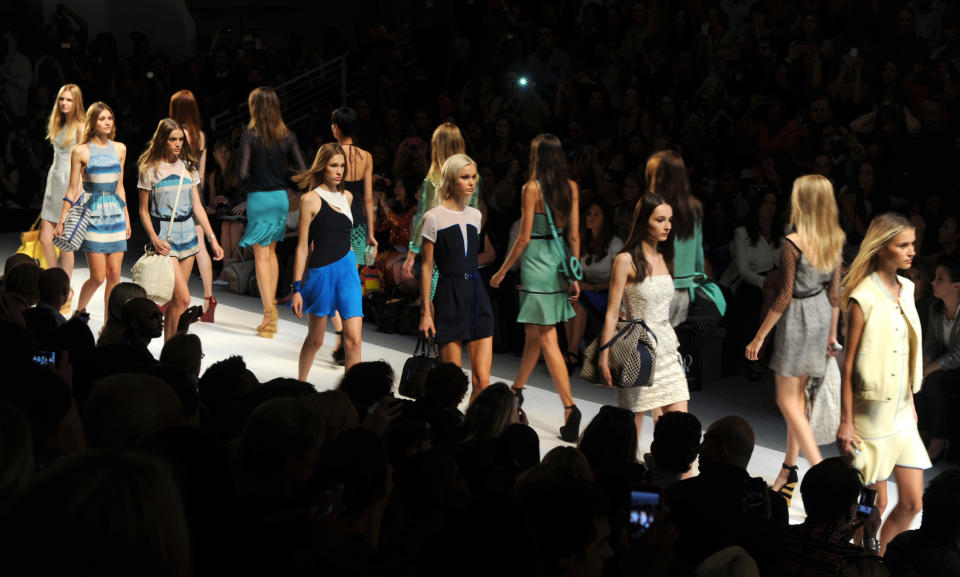 Models walk the runway at the end of the Charlotte Ronson spring 2013 show, Friday, Sept. 7, 2012, at Fashion Week in New York. (Photo by Diane Bondareff/Invision/AP)