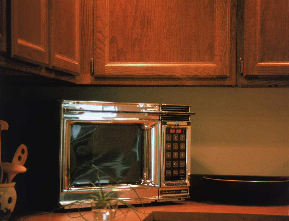 <p>The microwave was created by Percy Spencer using radar technology from WWII in 1946 and became hugely popular in the 1980s when the microwave sparked a convenience – the ready meal revolution. (Rex) </p>