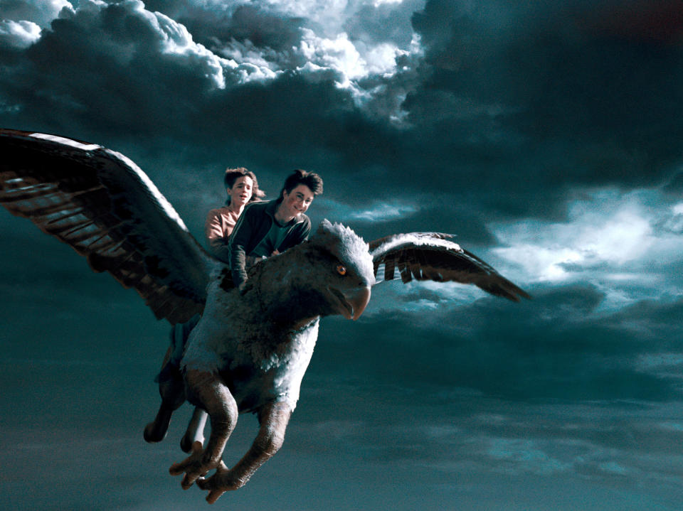 Hermione (Emma Watson) and Harry (Daniel Radcliffe) flying Buckbeak the Hippogriff in Prisoner of Azkaban. (Alamy)