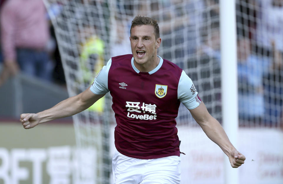 Burnley's Chris Wood celebrates scoring his side's first goal of the game during the English Premier League soccer match between Burnley and Norwich City at the Turf Moor Stadium, Burnley,England. Saturday, Sept. 21 2019. (Richard Sellers/PA via AP)