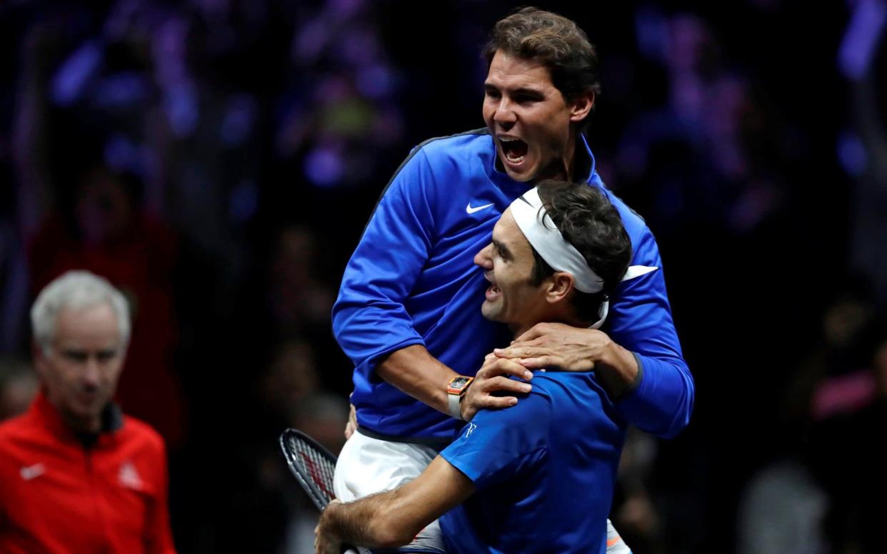 Rafael Nadal (L) congratulates Roger Federer after Europe won the inaugural Laver Cup - REUTERS
