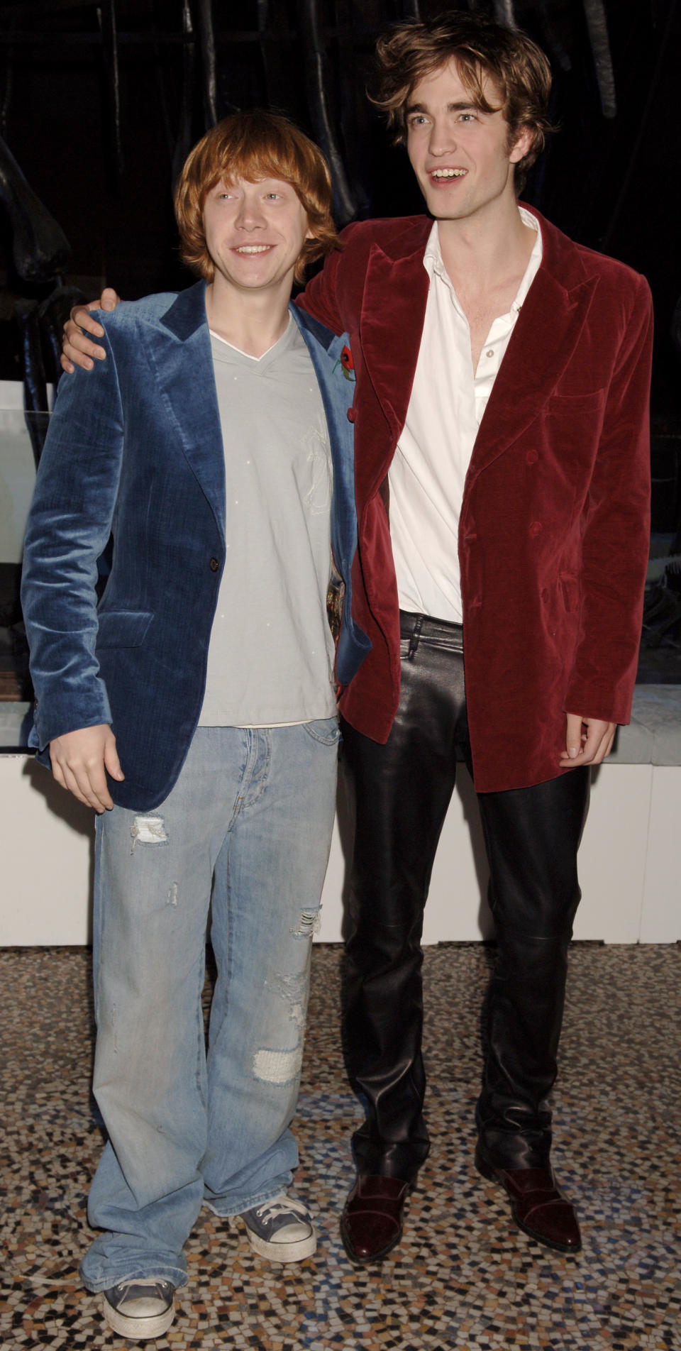 Rupert Grint (left) and Robert Pattinson during the aftershow party for the film 'Harry Potter and the Goblet of Fire', at the Natural History Museum, South Kensington, London.