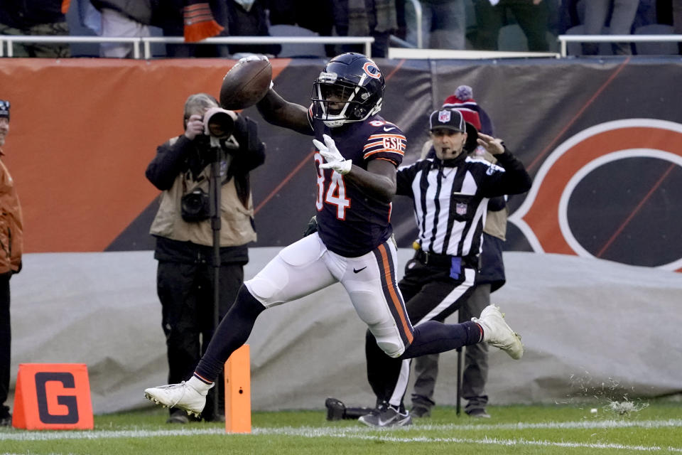 Chicago Bears wide receiver Marquise Goodwin scores on a deep pass from quarterback Andy Dalton during the second half of an NFL football game Sunday, Nov. 21, 2021, in Chicago. The Ravens won 16-13. (AP Photo/David Banks)