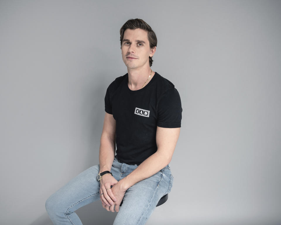 This July 31, 2019 photo shows Antoni Porowski, a cast member in the Netflix series "Queer Eye," posing for a portrait in New York to promote his new cookbook "Antoni in the Kitchen." (Photo by Christopher Smith/Invision/AP)