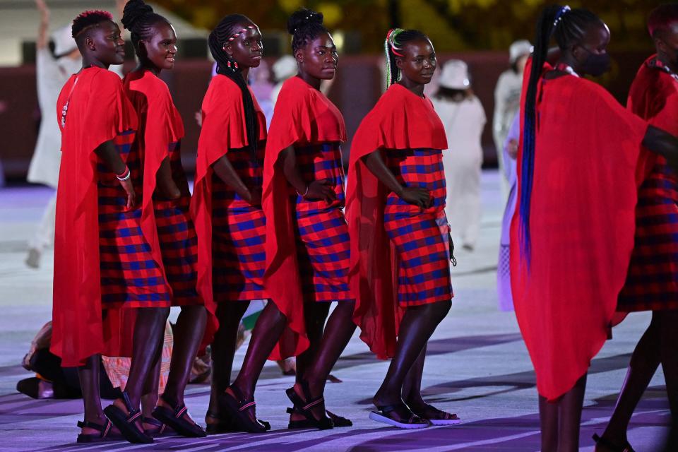 <p>Members of Kenya's delegation parade during the opening ceremony of the Tokyo 2020 Olympic Games. (Photo by Andrej ISAKOVIC / AFP) (Photo by ANDREJ ISAKOVIC/AFP via Getty Images)</p> 